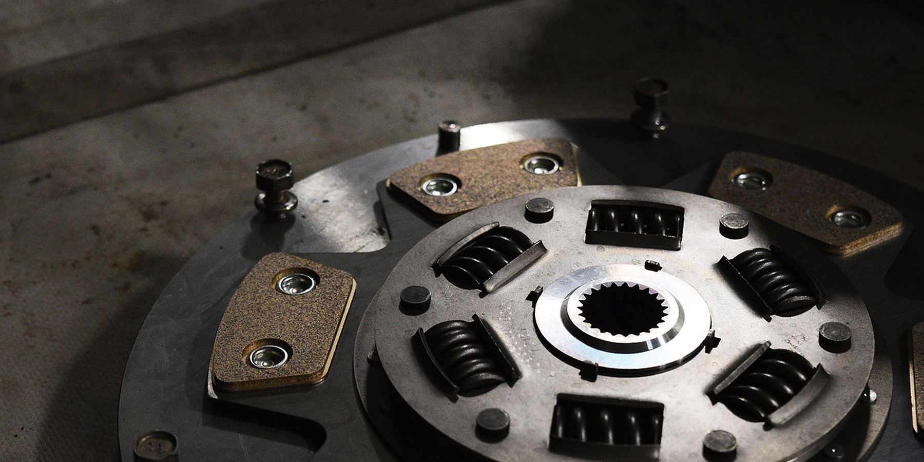 Clutch and flywheel repair work on a bench